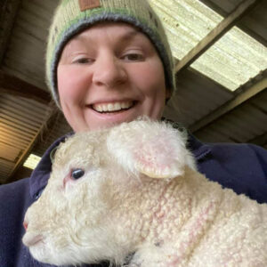 Emma Williams with newborn lamb
